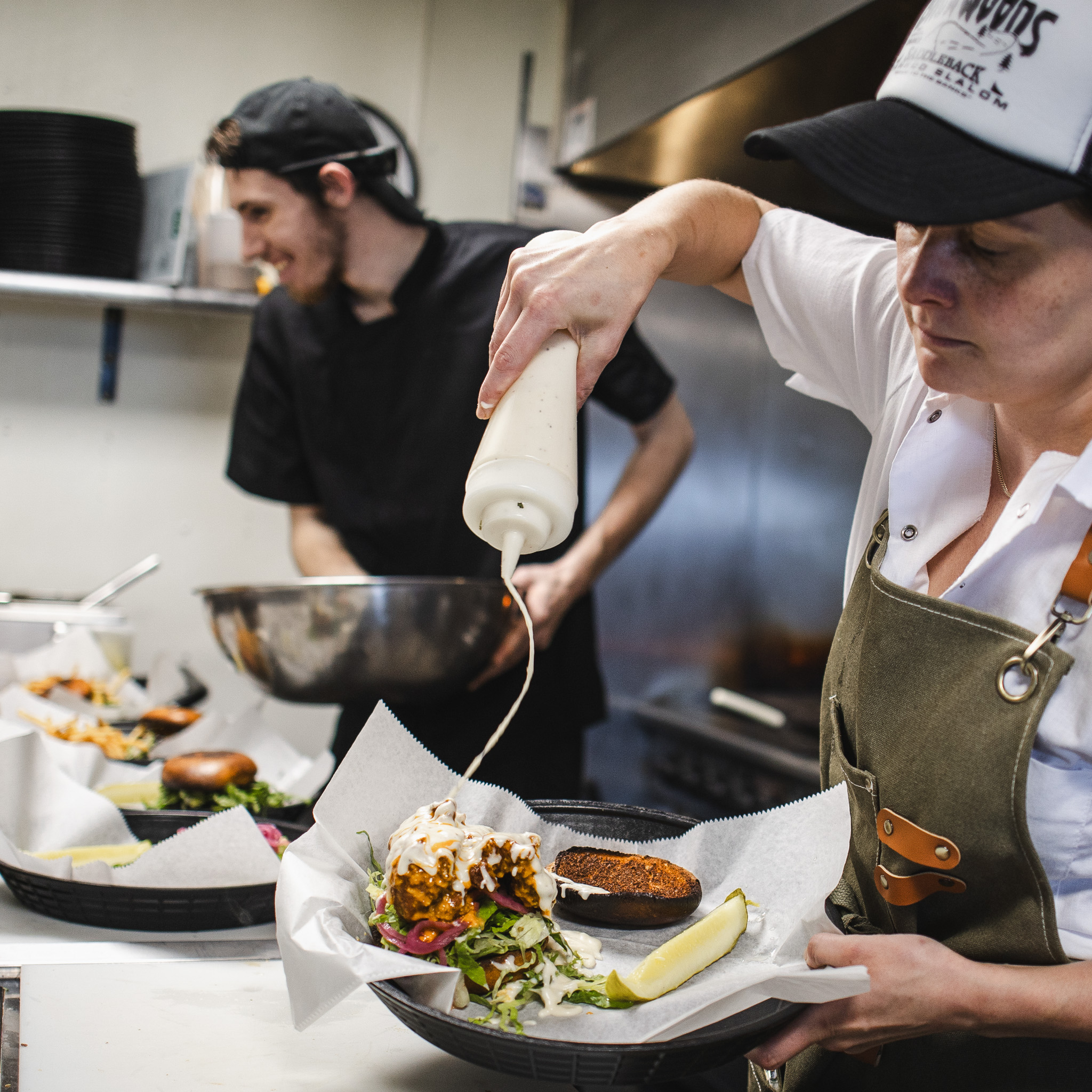 Chef Coco and John on the line