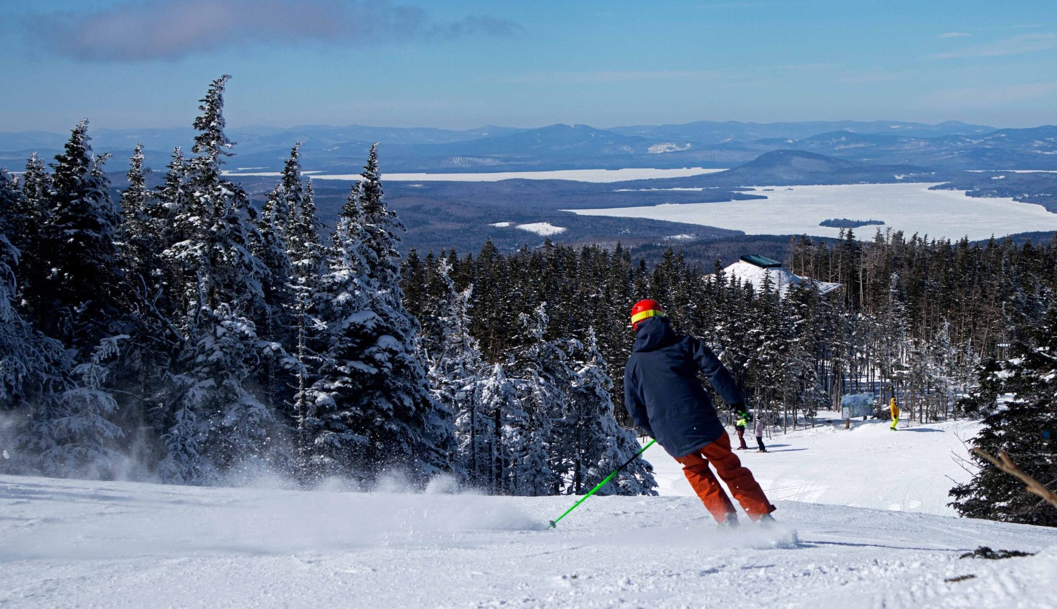 Skier on Tri-Color blue sky views