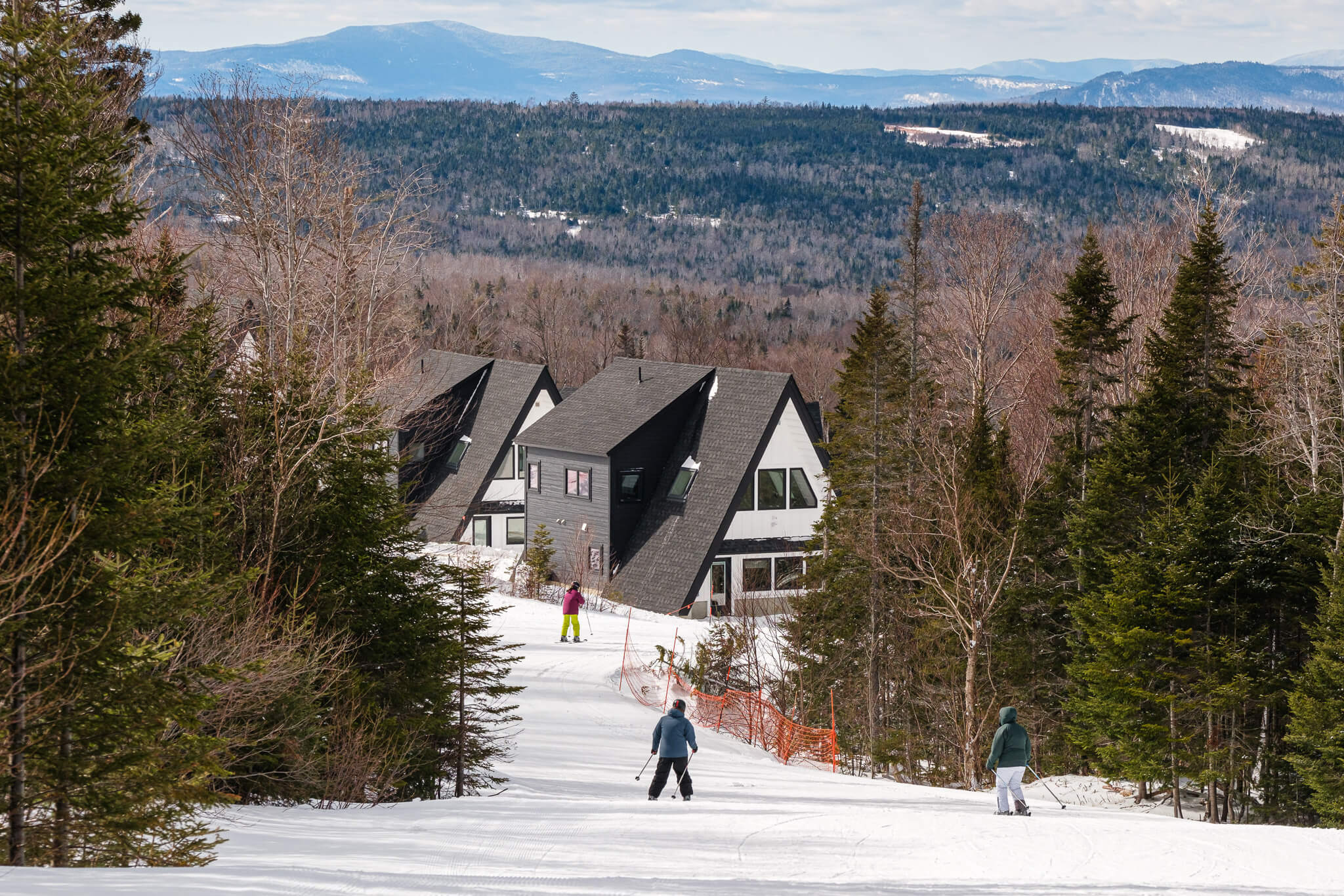 Skiers on Smelt Streamer trail headed to A-Frame village